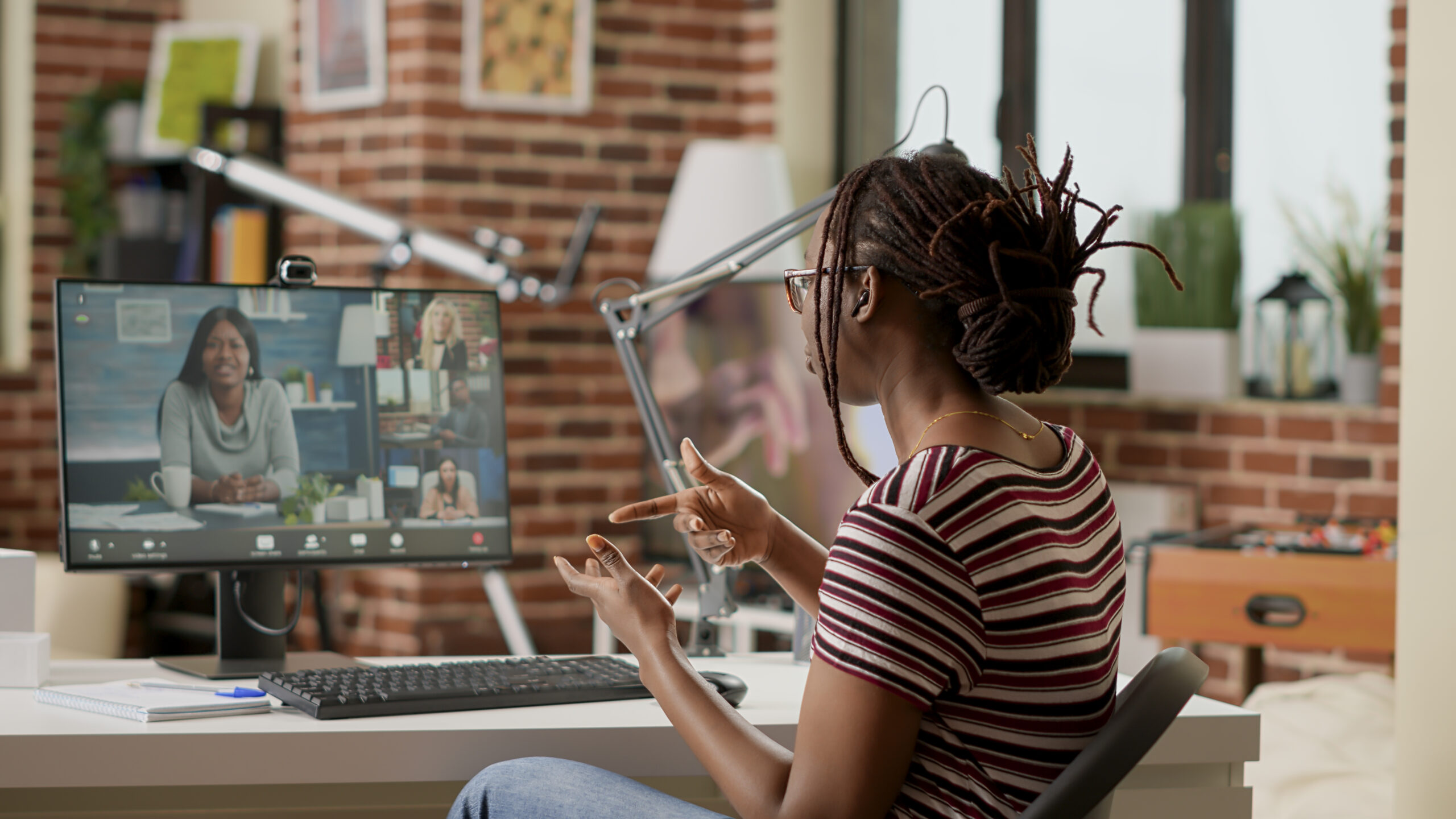 Company employee attending videocall business meeting